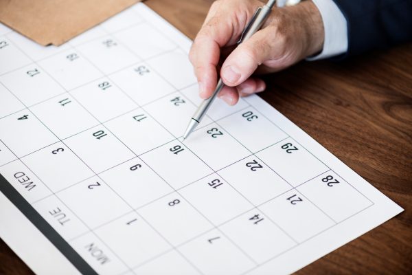 businessman-marking-calendar-appointment